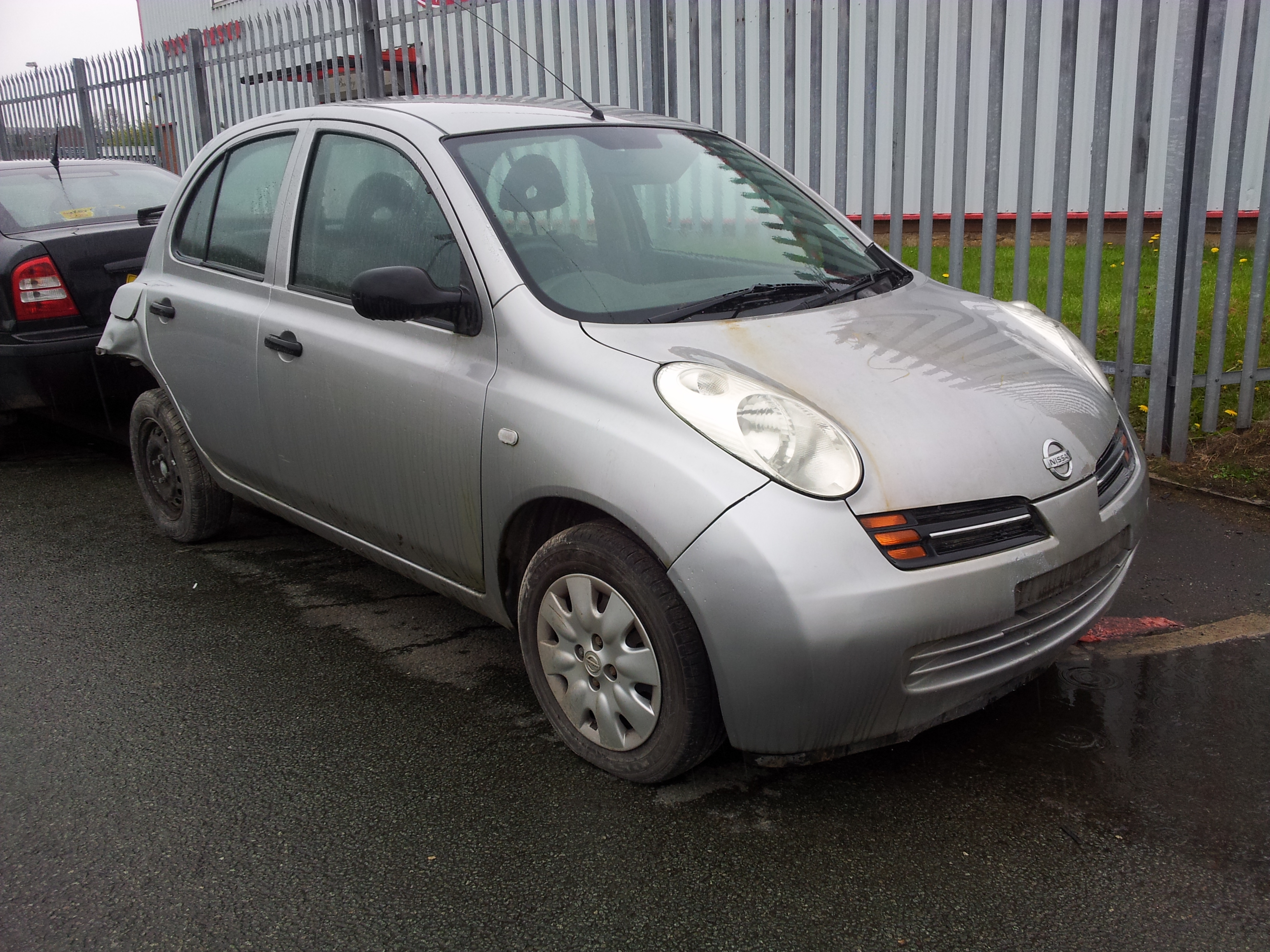 Nissan Micra E door-check-strap-driver-side-front